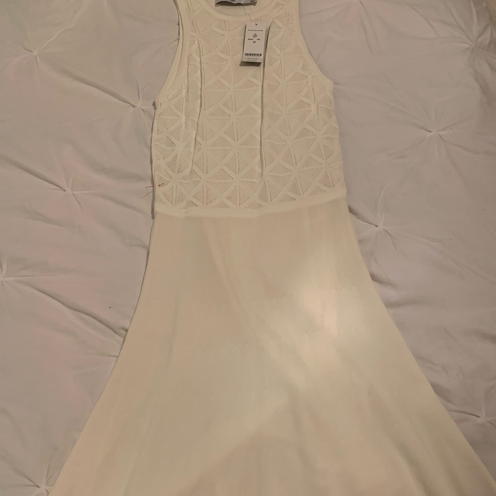 DRESS IS WHITE - Picture 3 of 3